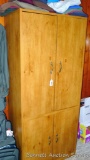 Sturdy wardrobe would be great in an entry or bedroom. Stands approx. 6' tall x 31