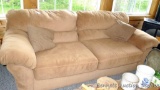 Nice overstuffed sofa in good condition, matching chair lot 258. Couch measures approx. 8' across