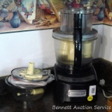 Cuisinart Elite 12 cup food processor with accessories, manual & DVD is in good condition. Works.