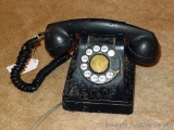 Antique telephone with no markings found. Case is sturdy, but could use a cleaning.