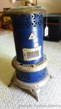 Cute little Perfection Oil Heater No. 530 stands 2' tall and is in good shape.