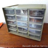 Smaller organizer drawer unit with decorative leather rounds and embellishments. Cabinet measures 9