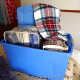 Large tote with comforter, bed skirt, throw blankets, heavy sherpa lined quilt. Bedding is