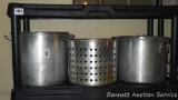 Stock pot with strainer basket, plus another stock pot. Larger pot holds basket and ia 13-1/2