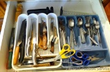 Flatware includes forks, spoons, butter knives; also kitchen scissors, paring knives, bread knife