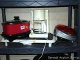 Presto griddle, Mr. Coffee coffee maker, West Bend cooker, Lean Mean Fat Grilling machine. All heat