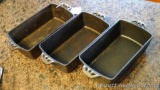 Three cast iron loaf pans by Camp Chef Home. Loaf pans measure 9