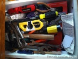 Kitchen tool drawer includes hammer, wrenches, needle nose pliers, LevelPro level, screwdriver,