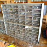 Double storage unit with variety of screws, bolts, fuses, electrical supplies and more. Each unit is