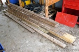 Stack of lumber, some treated, mostly 2