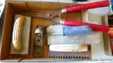 Two glue trowels, largest is 4-1/2