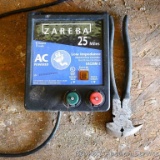 Zareba 25 mile electric fence controller EAC25M-Z, light comes on and clicks; 10-1/2