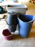 Assorted sizes of garbage containers and pails.