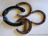 Two St. Croix Forge pony shoes; one other pony shoe; horse shoe 6