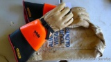 Pair of lineman gloves style GPS 14F size 10 with cloth bag for storage.