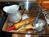 Vintage and newer kitchen tools including red handled wooden rolling pin, strainer, jello molds,