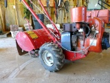 Troy-Bilt Econo-Horse Tiller with Tecumseh H60 engine. Comes with owner's manual. Belt shield is