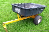 Cub Cadet 10 cu ft dumping yard cart with a 4' x 3' rust-proof tub. Good condition overall, one tire