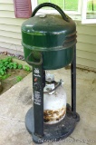 Char Broil Patio Caddy LP gas grill with partial OPD tank of propane.