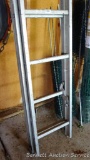 Aluminum extension ladder, sections total 20'.