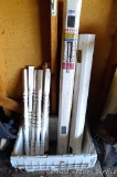 PVC stair railing posts and spindles, plus a sturdy tote.