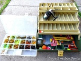 Plano lockable 6300 tackle box with tackle and reel, plus another tackle organizer with contents.
