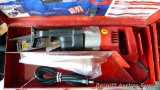 Milwaukee Sawzall with blades and steel case. Works. Has Quiklok blade clamp