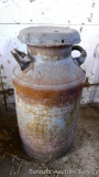 Delightfully rustic milk can is 2' tall.