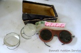 Vintage tinted torch glasses, clear safety glasses with side shields, and some old stamps. One cent