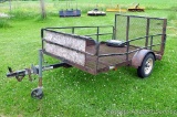 Big Max expanded metal utility ATV trailer with drop ramp and removeable sides. Bed is approx. 8' x