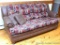 Couch with faux leather with fabric cushions; measures 82