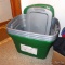 Four 18 gallon totes with lids, plus one smaller.