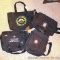 Four tote or laptop computer bags, largest is 17