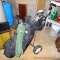 Golf clubs with bag by Peerless Golf Equipment and cart. Clubs include Women's Wilson 1, 3 and 5,