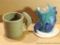 Ceramic fish mug and pen holder by Irene Gimeno. Pen holder has a break on the fin. Mug in good