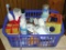 Basket of bathroom supplies includes soap, electric toothbrush, toothbrush holder, razor, organizer