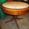 Cute little marble topped pedestal table is 2-1/2' across.