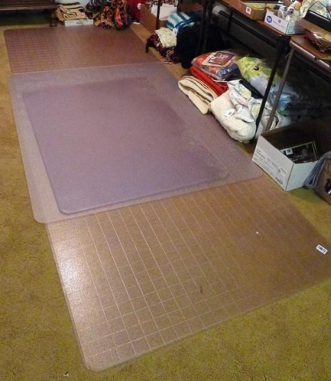 Four plastic office mats for rolling chairs up to 5'. No shipping.