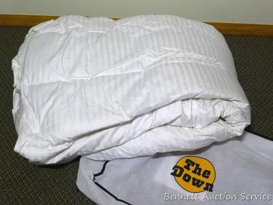 Twin size goose down comforter in good condition.