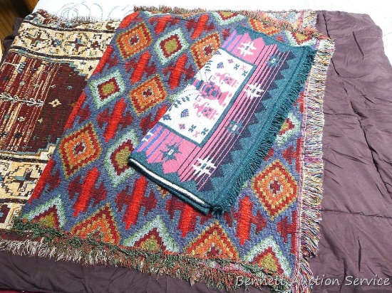 Three nice rugs, largest is 61" x 37", 2 have a couple of pulled threads on the back; twin size