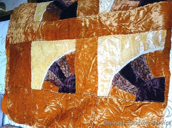 100" x 82" quilt has stains on the back and a couple of dirty spots on front.
