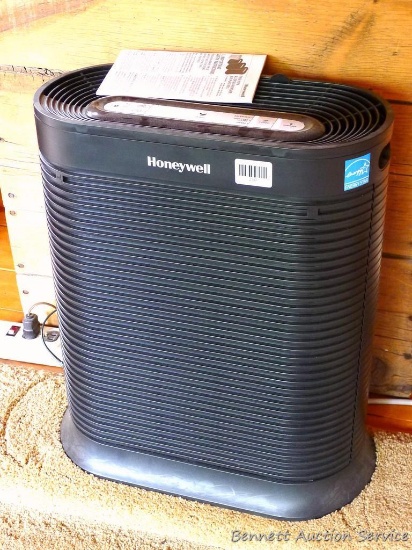 Honeywell True Hepa Allergen Remover Air Purifier; measures 9" x 18-1/2" x 22-1/2" tall. Turns on.