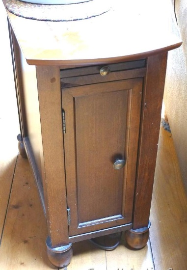 Cute little end table with door and sliding shelf; measures 12"w x 24"d x 24"t.