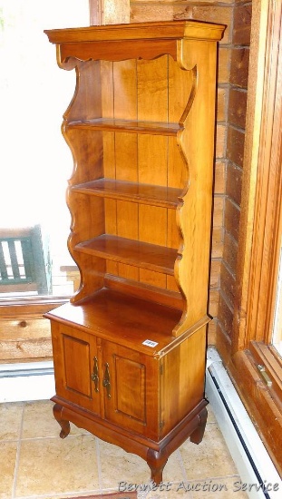 Cute little storage cabinet is 13" x 20-1/2" x 60". Has three 7" shelves on top and storage behind