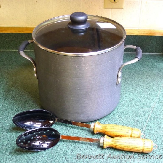 Calphalon 8 qt. kettle with lid is 9" x 9"; pair of wooden handled spoons.