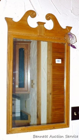 Wooden framed wall mirror is 20-1/2" x 36".
