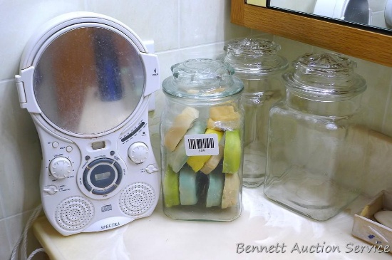Set of three canisters, one filled with bars of soap, plus a Spectra radio/compact disc player. Disc