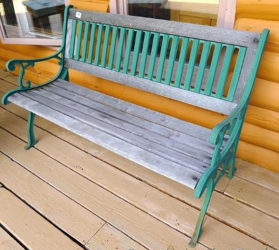 Nice sturdy cast iron and hardwood bench is about 50" x 24" x 33" tall at back.
