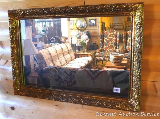 Pretty mirror is about 28" x 40". Three chipped spots could be touched up with gold paint.