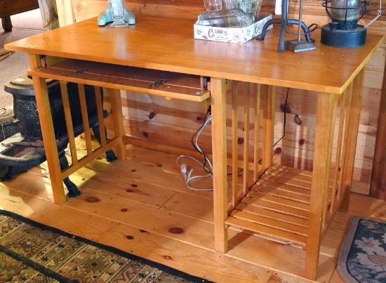 Pretty little desk has a drawer and storage space underneath. Measures 52" x 26" x 30" tall. Looks